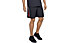 Under Armour Woven Graphic Wordmark - pantaloni corti fitness - uomo, Black/Red/Grey